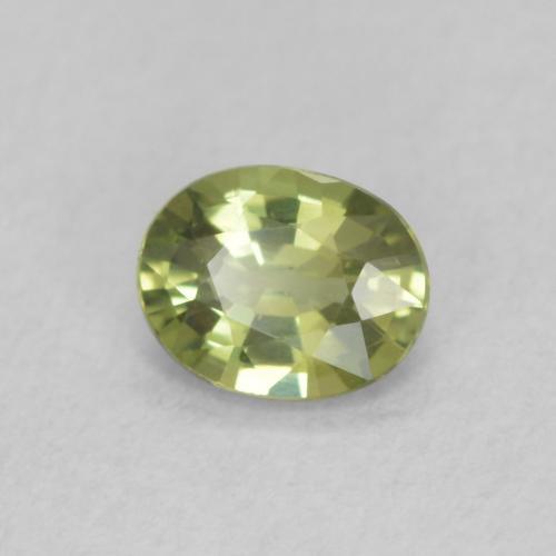 Zafiro Verde amarillo natural de 0.41 ct, Ovalada, VVS