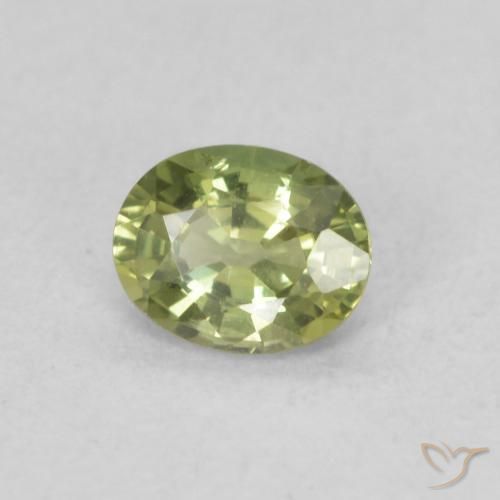 Zafiro Verde amarillo natural de 0.39 ct, Ovalada, VS