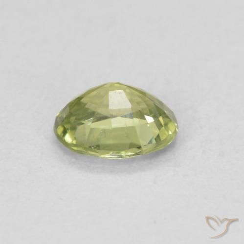 Zafiro Verde amarillo natural de 0.39 ct, Ovalada, VS