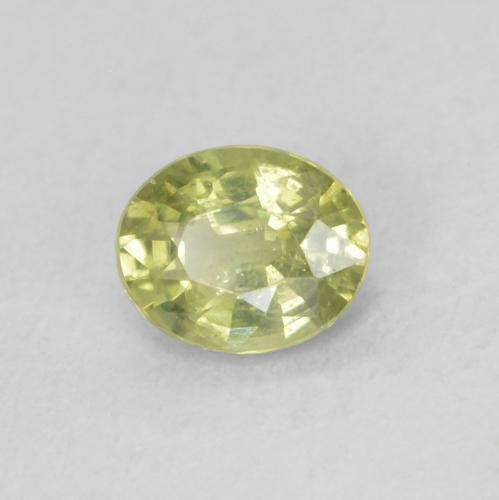 Zafiro Verde terroso cálido natural de 0.42 ct, Ovalada, VS