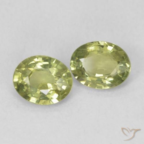 Gemas de Zafiro Verde terroso cálido natural de 0.78 ct, Ovalada, VS