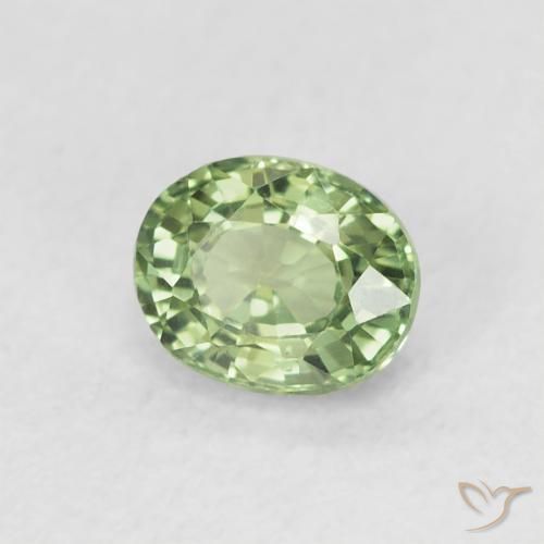 Zafiro Verde claro natural de 0.64 ct, Ovalada, VVS