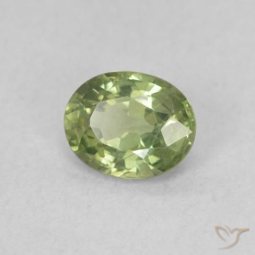 Zafiro Verde cálido natural de 0.42 ct, Ovalada, VVS-VS