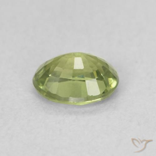 Zafiro Verde amarillento natural de 0.47 ct, Ovalada, VVS-VS