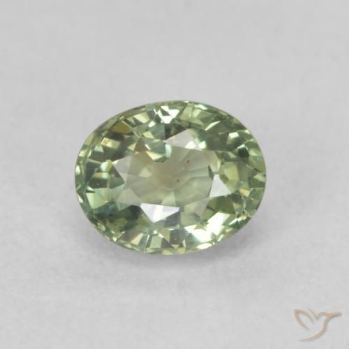 Zafiro Verde claro natural de 0.69 ct, Ovalada, VS