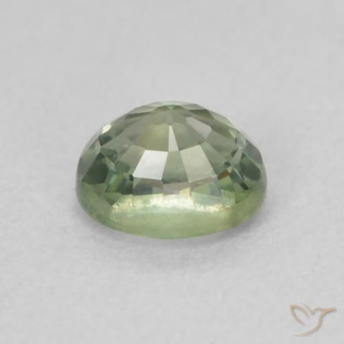 Zafiro Verde claro natural de 0.69 ct, Ovalada, VS