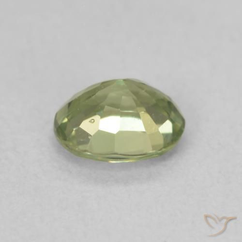 Zafiro Verde cálido natural de 0.53 ct, Ovalada, VS