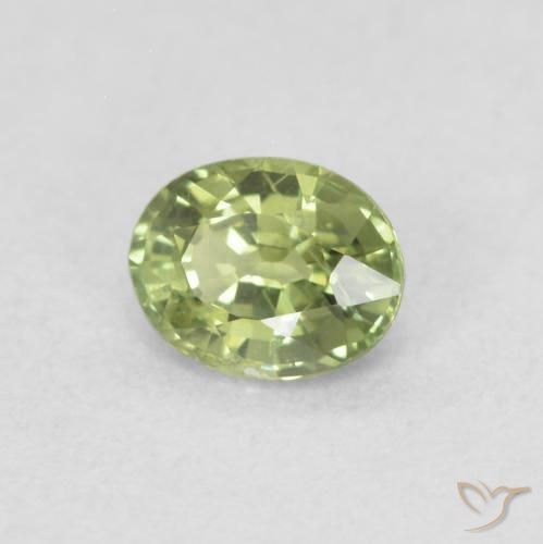 Zafiro Verde amarillento natural de 0.42 ct, Ovalada, VS