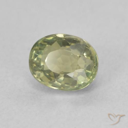 Zafiro Verde amarillo natural de 0.76 ct, Ovalada, VS