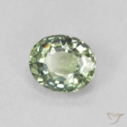 Zafiro Verde terroso natural de 0.58 ct, Ovalada, VVS