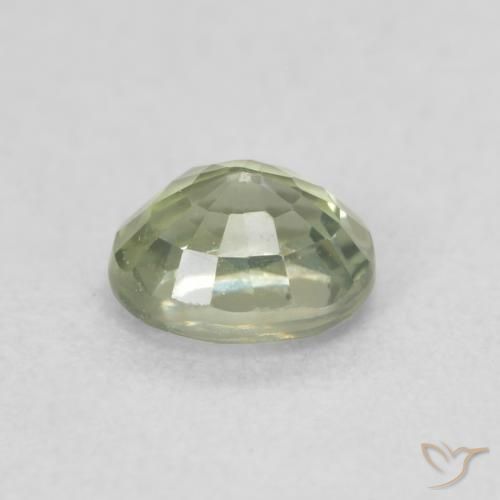 Zafiro Verde terroso natural de 0.58 ct, Ovalada, VVS