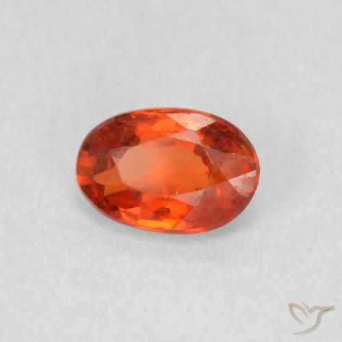 Zafiro Naranja cálido natural de 0.62 ct, Ovalada, VS