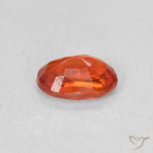 Zafiro Naranja cálido natural de 0.62 ct, Ovalada, VS