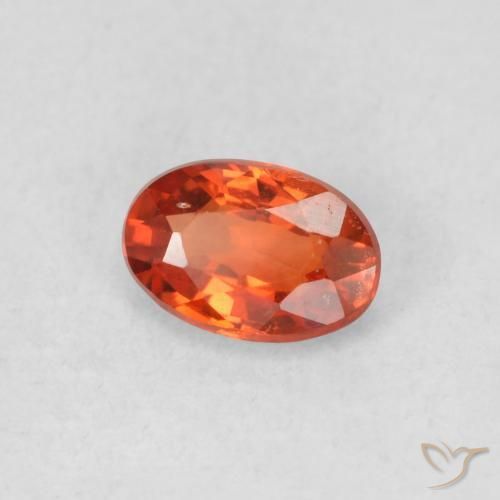 Zafiro Naranja cálido natural de 0.56 ct, Ovalada, VS