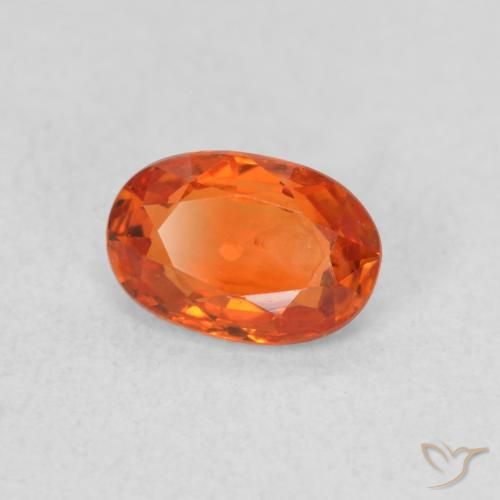 Zafiro Naranja medio natural de 0.64 ct, Ovalada, VS