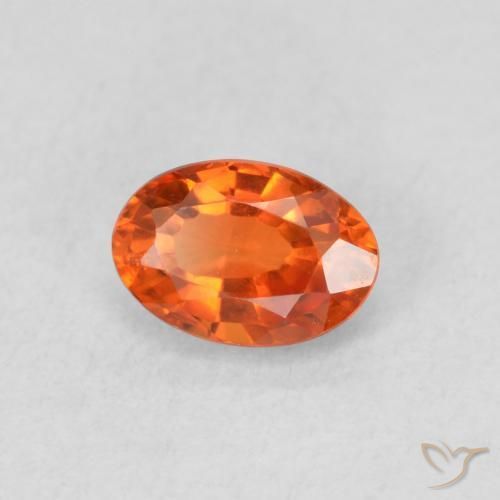 Zafiro Naranja fuego natural de 0.63 ct, Ovalada, VS