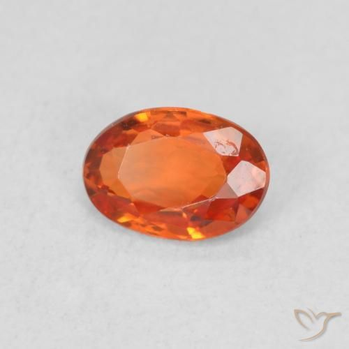 Zafiro Naranja cálido natural de 0.57 ct, Ovalada, VS