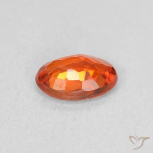 Zafiro Naranja cálido natural de 0.57 ct, Ovalada, VS
