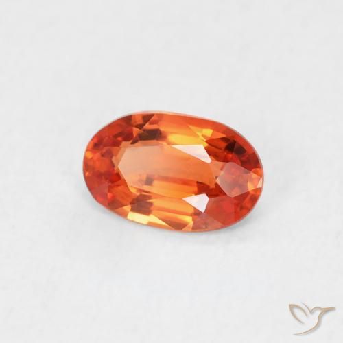 Zafiro Naranja rojizo natural de 0.54 ct, Ovalada, VVS