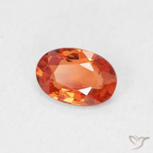 Zafiro Naranja medio natural de 0.61 ct, Ovalada, VVS-VS