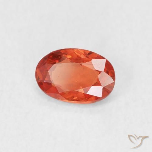 Zafiro Naranja rojizo natural de 0.53 ct, Ovalada, VS