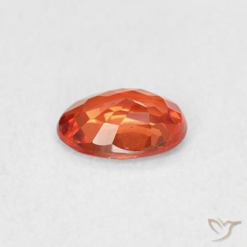Zafiro Naranja rojizo natural de 0.53 ct, Ovalada, VS