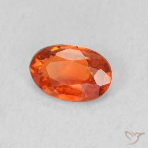 Zafiro Naranja medio natural de 0.51 ct, Ovalada, VS