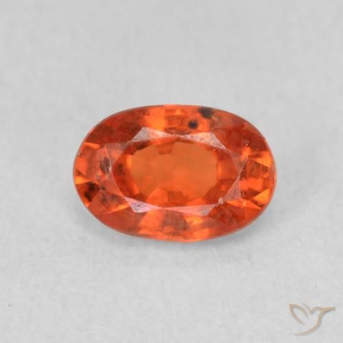 Zafiro Naranja medio natural de 0.68 ct, Ovalada, VS