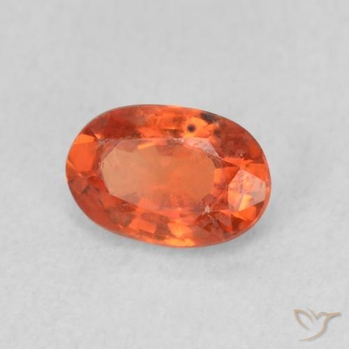 Zafiro Naranja medio natural de 0.68 ct, Ovalada, VS