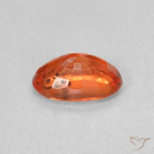 Zafiro Naranja medio natural de 0.68 ct, Ovalada, VS