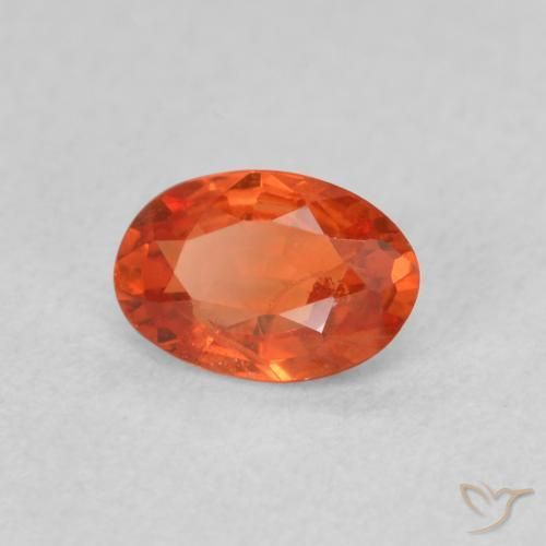 Zafiro Naranja medio natural de 0.52 ct, Ovalada, VS