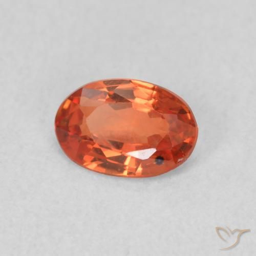 Zafiro Naranja rojizo natural de 0.56 ct, Ovalada, VS