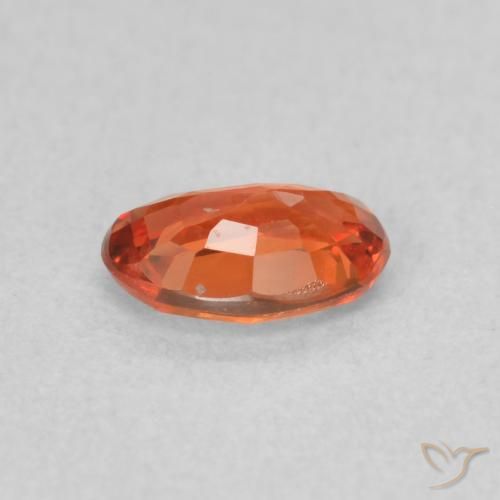 Zafiro Naranja rojizo natural de 0.56 ct, Ovalada, VS