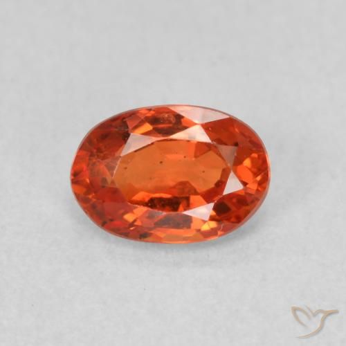0.73ct Natural Naranja cálido Zafiro, Ovalada, VS