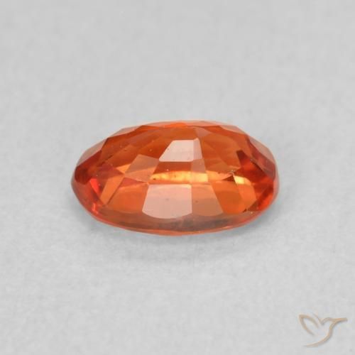 Zafiro Naranja cálido natural de 0.73 ct, Ovalada, VS