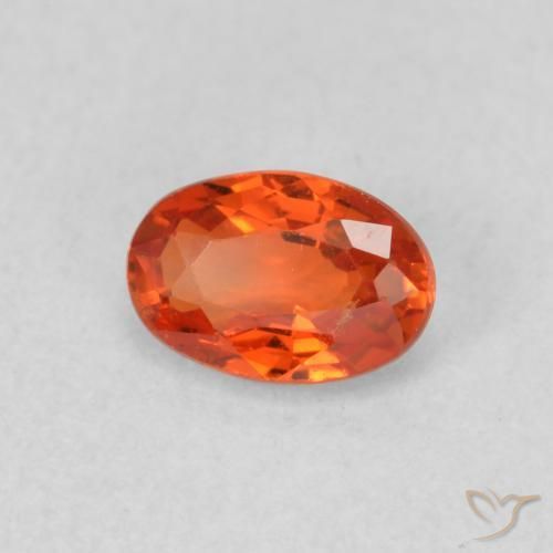 Zafiro Naranja fuego natural de 0.61 ct, Ovalada, VS