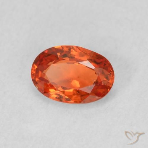 Zafiro Naranja rojizo natural de 0.54 ct, Ovalada, VS
