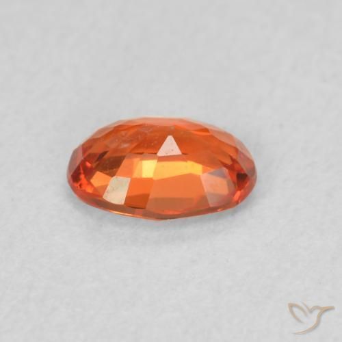 Zafiro Naranja rojizo natural de 0.54 ct, Ovalada, VS