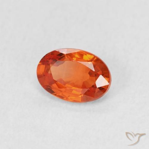 Zafiro Naranja rojizo natural de 0.69 ct, Ovalada, VS