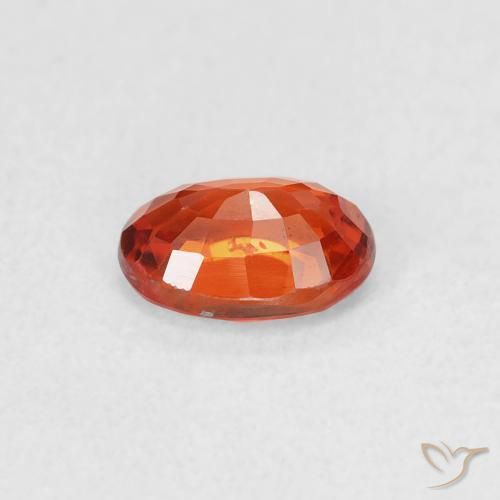 Zafiro Naranja rojizo natural de 0.68 ct, Ovalada, VVS-VS