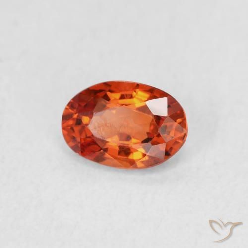 Zafiro Naranja rojizo natural de 0.58 ct, Ovalada, VVS
