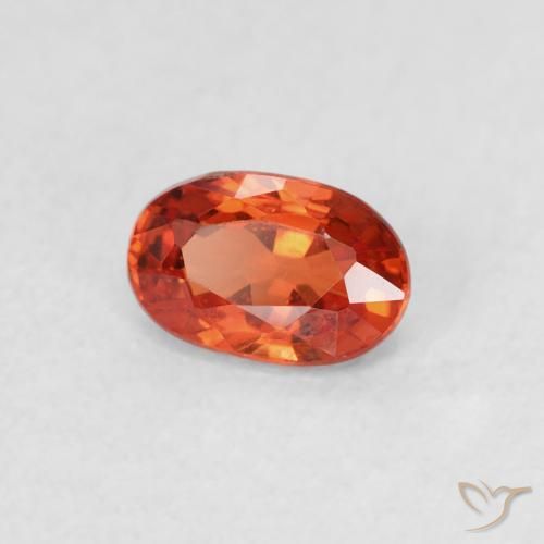 Zafiro Naranja rojizo natural de 0.65 ct, Ovalada, VVS