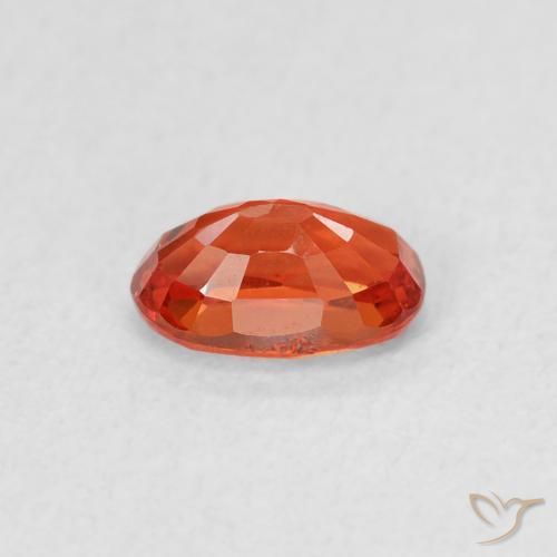 Zafiro Naranja rojizo natural de 0.65 ct, Ovalada, VVS