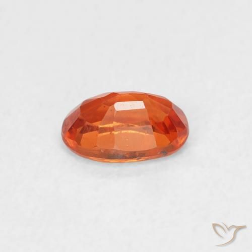 Zafiro Naranja rojizo natural de 0.59 ct, Ovalada, VS
