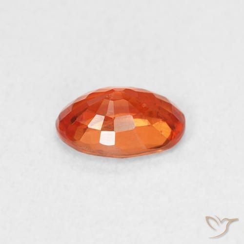 Zafiro Ámbar naranja natural de 0.62 ct, Ovalada, VS