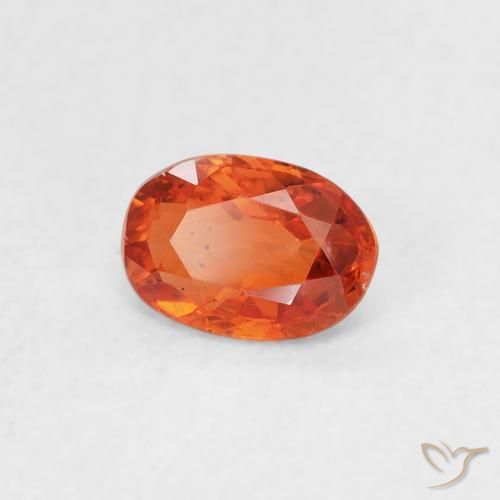Zafiro Naranja rojizo natural de 0.59 ct, Ovalada, VS