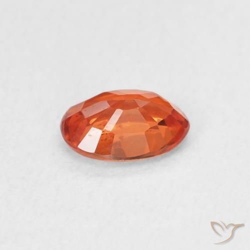 Zafiro Naranja rojizo natural de 0.59 ct, Ovalada, VS