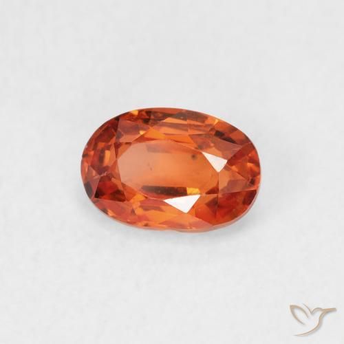 Zafiro Naranja medio natural de 0.68 ct, Ovalada, VS