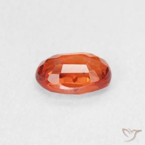 Zafiro Naranja medio natural de 0.68 ct, Ovalada, VS