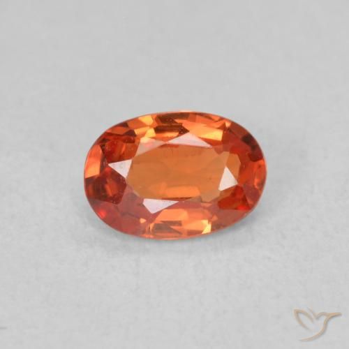 0.54ct Natural Naranja rojizo Zafiro, Ovalada, VS